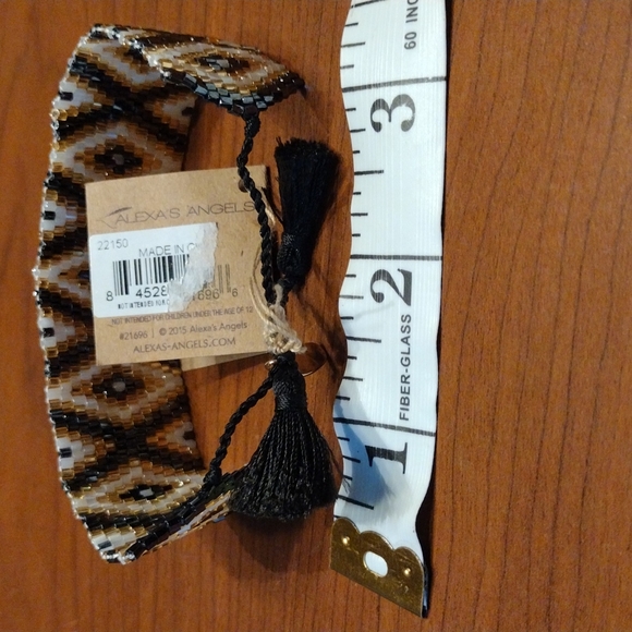 Alexa's Angels pull string Clasp bracelet. - Picture 6 of 9